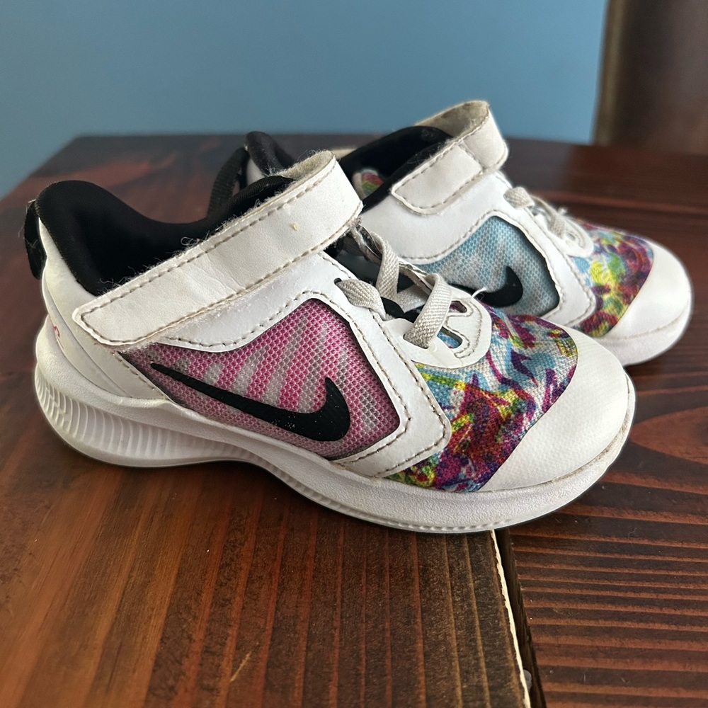 Nike Downshifter 10 Fable Fire Pink Tortoise and the Hare shows kids size 7